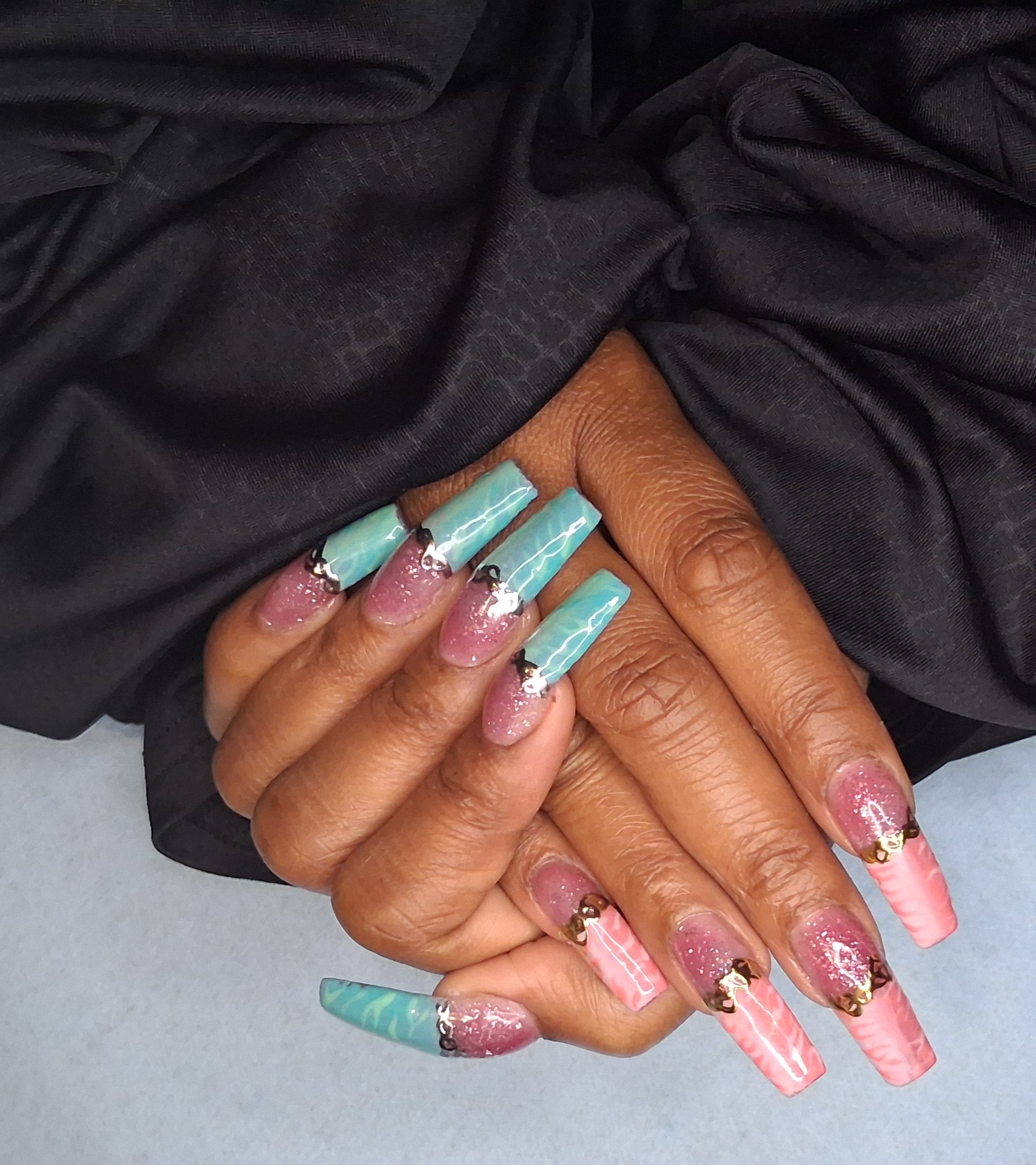 Pink and aqua French tip nail design
